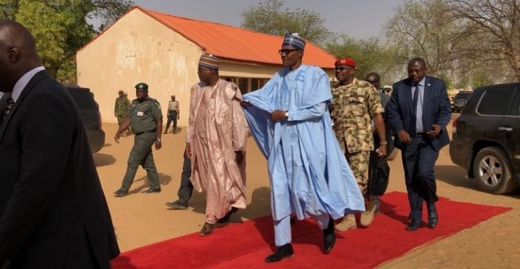 President Buhari Visits Dapchi School Where Boko Haram Abducted 110 Girls Reassures Parents Photos 3