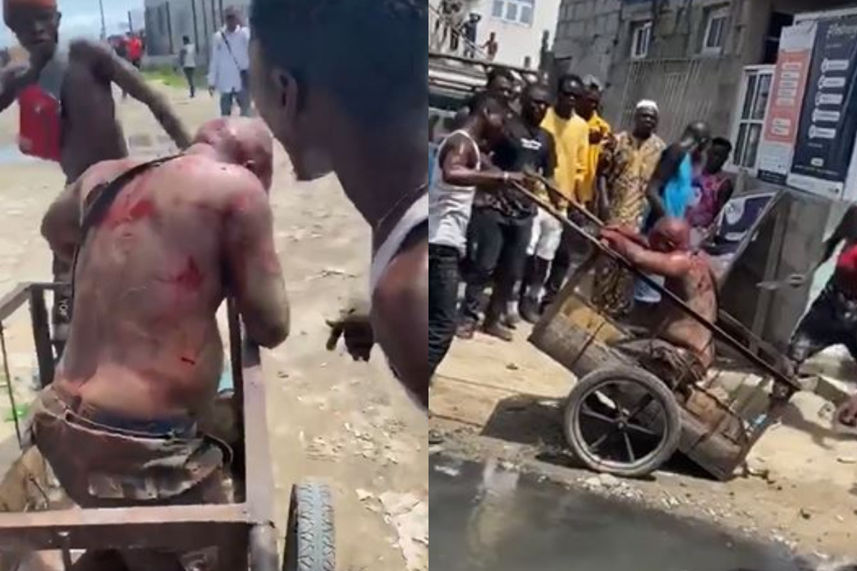 DPO Of Olosan Police Station Who Allegedly Shot And Killed 11 Protesters Beaten To Stupor By Mushin Mob (Video)