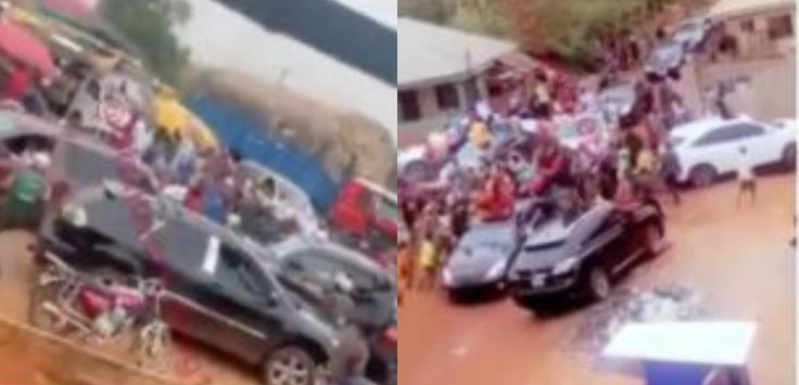 Suspected ‘Yahoo Boys In Auchi Polytechnic Spray Money On The Streets As They Celebrate Graduation Video