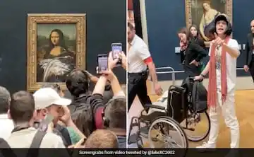 Mona Lisa: Man Disguised As Elderly Woman Smears Mona Lisa's Portrait With Cake [Video]