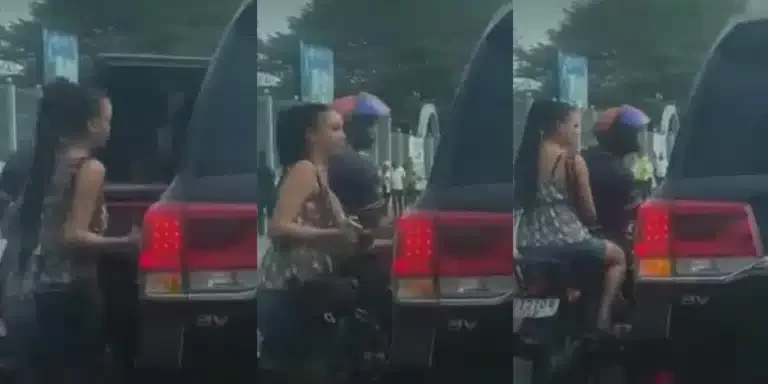 lady on bike hops into car