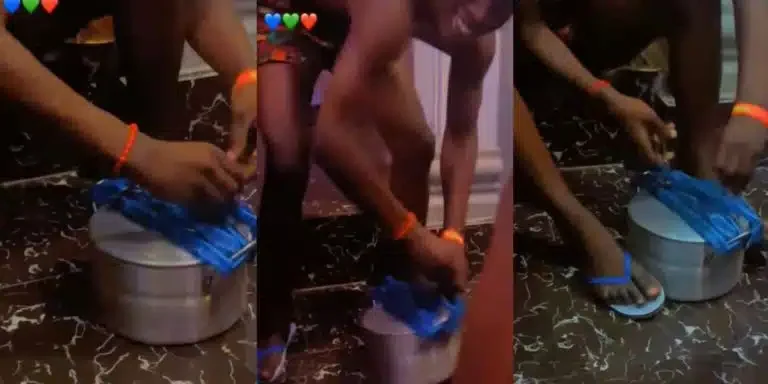 “Everywhere is Tough” – Nigerian Man Causes Reactions As He Locks Pot of Rice With Padlock and Chains