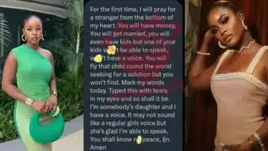 Bella Okagbue prays for lady